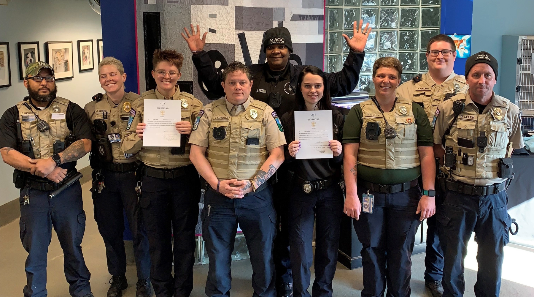 RACC staff show off their certificates.