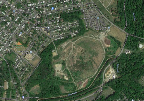this image is an aerial photo showing the Richmond landfill with neighborhoods nearby