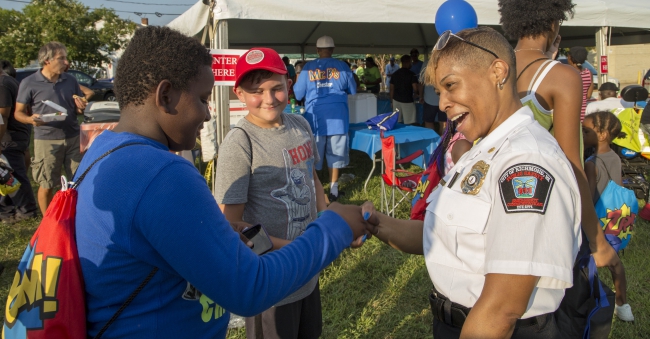 staff visiting kids at National Night Out 2019