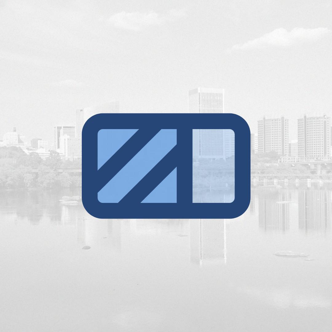 Image of a battery in front of a Richmond cityscape. 