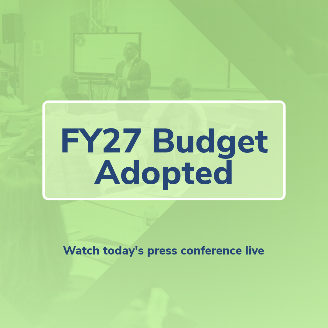 The words "FY27 Budget Adopted; Watch today's press conference live" on a green background